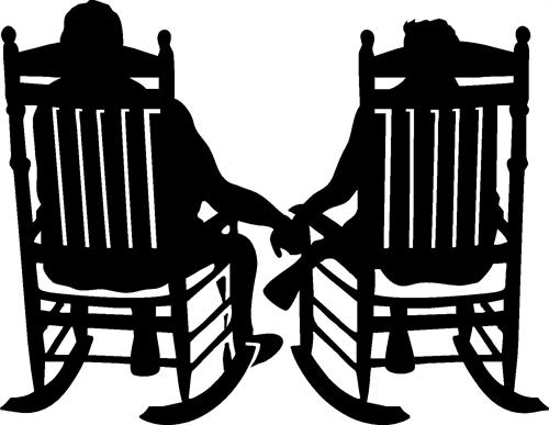 couple holding hands in chairs